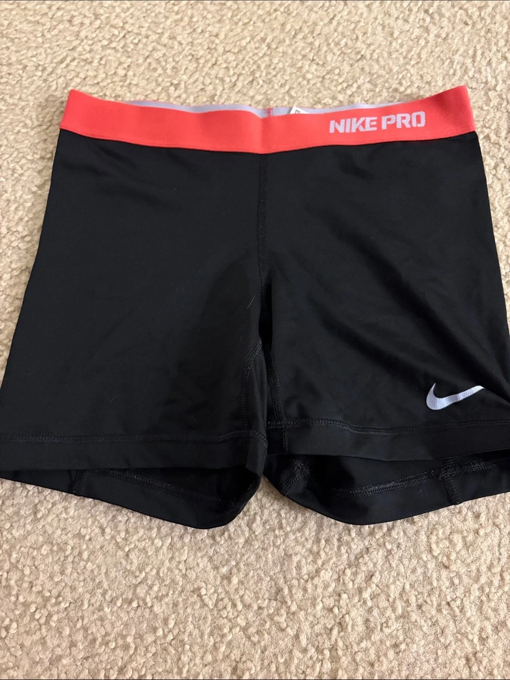 Nike Black Shorts with Coral Waistband and White Swoosh